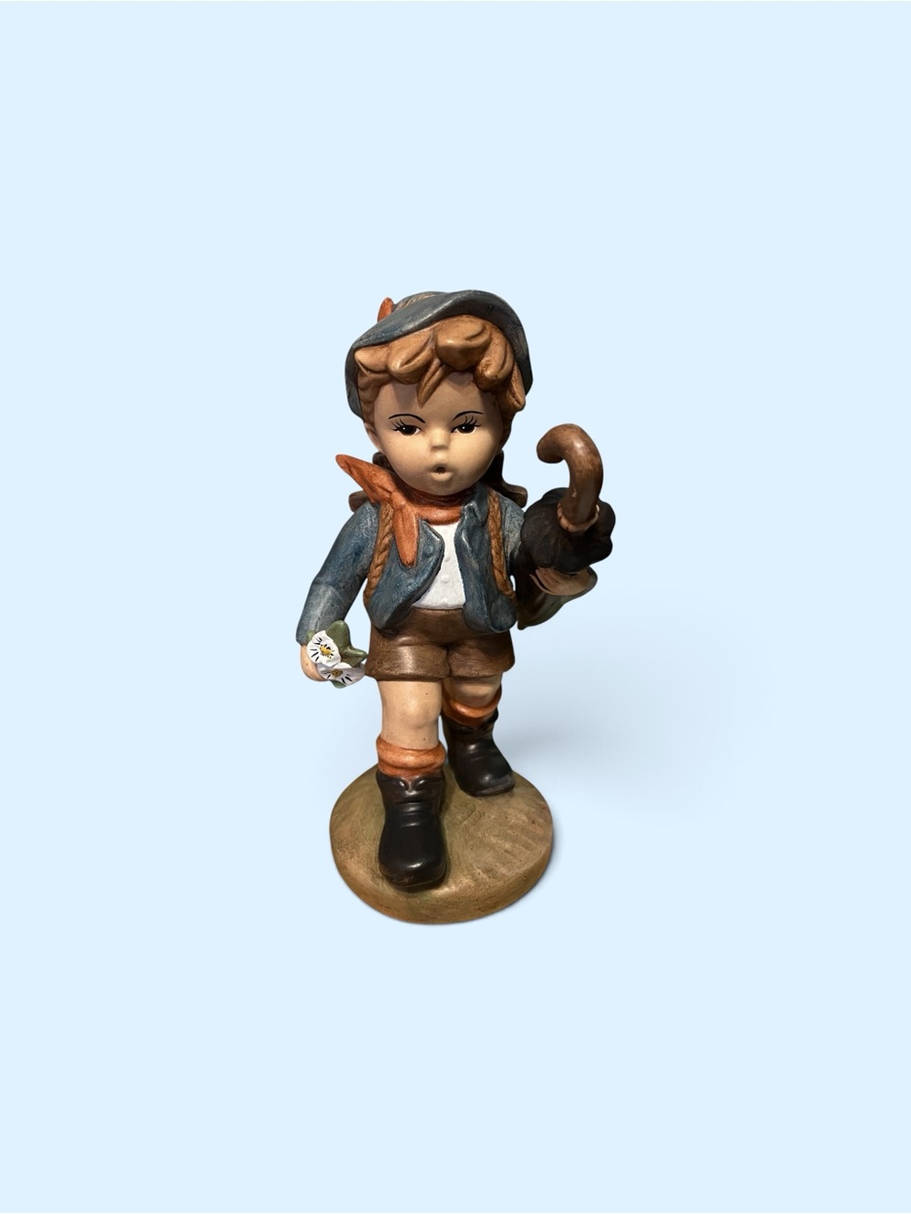 Hand-Painted Ceramic Boy Figurine in Blue and Brown “Merry Wanderer”